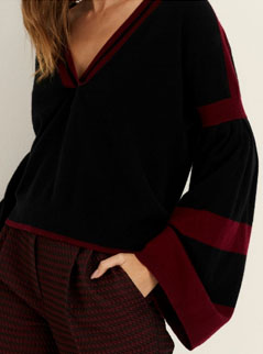 A luxurious cashmere knit with with statement sleeves